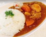A picture of step 12 of Quick and Easy Pressure Cooker Curry Rice.