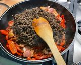 Une image de l'étape 8 de Lentilles brunes aux poivrons rouges et lard fumé.