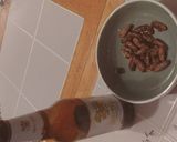 A picture of step 4 of Fried silk worms.