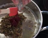 Foto del paso 6 de la receta: Arroz integral meloso con pulpo y berberechos frescos