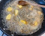 Foto del paso 3 de la receta: Naranjas con salsa tibia de mantequilla al caramelo