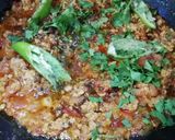 A picture of step 8 of Chicken qeema karahi.