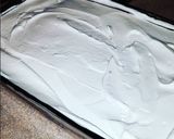 A picture of step 7 of Oreo Pudding Dessert.
