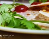 A picture of step 6 of Mexican cheese Quesadilla.