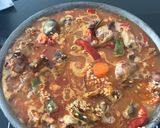 A picture of step 7 of Paella Rice with Rabbit.