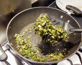 A picture of step 9 of Water Spinach fry with Garlic pods or Rashun diy Kolmi Shaak Bhaja.