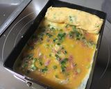 A picture of step 3 of Tamagoyaki with Pickled Ginger and Scallions.