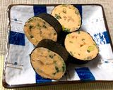 A picture of step 5 of Tamagoyaki with Pickled Ginger and Scallions.