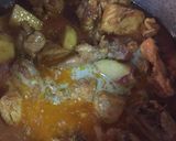 A picture of step 8 of Aloo chicken.