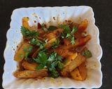 A picture of step 8 of Dry potatoe curry#cookingwith Tomatoescontest.