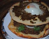 A picture of step 18 of Pizza with minced beef and egg.