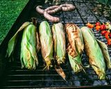 A picture of step 3 of Corn with black garlic and mango chutney butter.