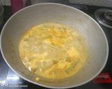 A picture of step 2 of Coconut Drumstick Curry.