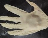 A picture of step 4 of Mummy kabab wrapped, hand garlic toast and eyeball punch.