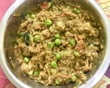 A picture of step 8 of Baingan bharta matar wala.