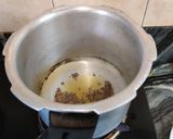 A picture of step 2 of Tomato Potato Curry with Panch Phoran.
