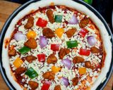 A picture of step 10 of Chicken pizza.