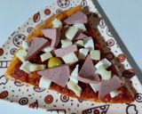 Une image de l'étape 11 de Pizza saucisson fromages 🍕.