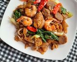Foto langkah ke 5 dari resep Kwetiau Goreng.