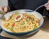 A picture of step 7 of Seafood linguine.