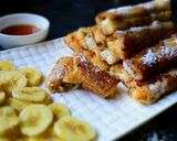 A picture of step 16 of Peanut Butter French Toast Roll-Ups With Banana & Almond Filling.