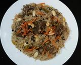 A picture of step 10 of Kabuli/afghani Pulao😋💛🍲.