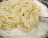 A picture of step 2 of Fettuccine Pasta 🍝 In Alfredo Sauce.