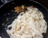 A picture of step 6 of Alfredo pasta.