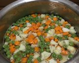 A picture of step 2 of Veg Hyderabadi Biryani with Boondi raita.