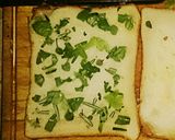 A picture of step 2 of Tex's Pizza Toastie 🐷🧀 🍞🌿🍕.