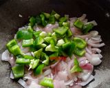 A picture of step 2 of Paneer, Onion and Capsicum sabzi.