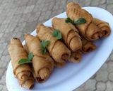 A picture of step 11 of Fish roll.