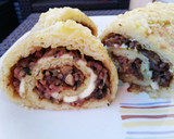 Foto del paso 11 de la receta: Rollo de patata al horno relleno de carne y champiñones