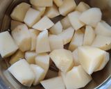 A picture of step 1 of LASANIYA BATATA nu SHAAK...