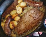 A picture of step 4 of Sirloin Steaks with fried baby potatoes & a greek salad.