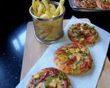 A picture of step 5 of Mini pizza#recipemarathon#baking.