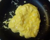 A picture of step 3 of Fluffy Scrambled Eggs.