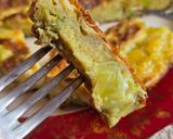 Foto del paso 7 de la receta: Tortilla de puerro y cebolla de verdeo