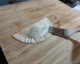 Foto del paso 4 de la receta: Empanadillas al horno de cebolla, champiñones y bacon ahumado