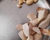A picture of step 1 of Arvi ki sukhi sabzi.