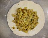 A picture of step 13 of Aloo walay nan.