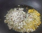 A picture of step 3 of Singapore Egg Fried Rice.