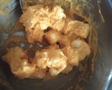 A picture of step 4 of Paneer tikka masala with cheese naan.