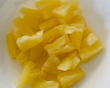 A picture of step 2 of Pineapple, cranberry and cashew raita.