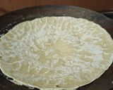 A picture of step 3 of Jowar Bhakri with brinjal potato vegetable curry.