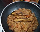 A picture of step 6 of Qeema karela.