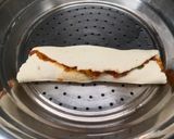 A picture of step 7 of Steamed stuff suji rolls.
