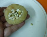 A picture of step 8 of Stuffed Badam kalash.