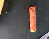A picture of step 4 of My cheese wrapped in Pepperoni and Savoury Crackers 🤩.