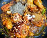 A picture of step 6 of Spicy chicken ghee roast.